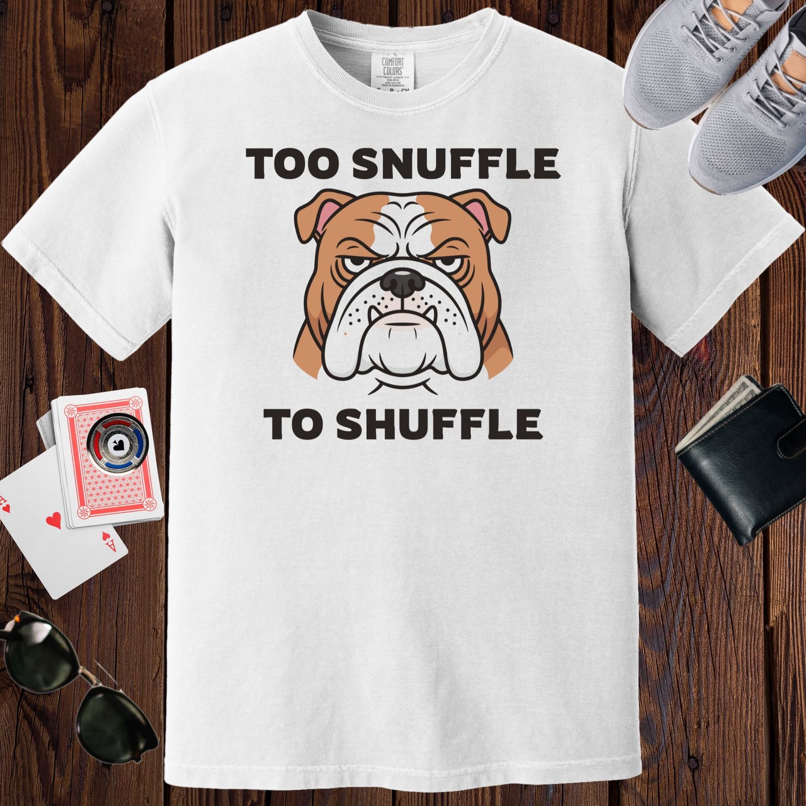 White colored unisex crewneck poker-themed T-shirt. Design features the text 'Too snuffle to shuffle' Image of a bulldog.