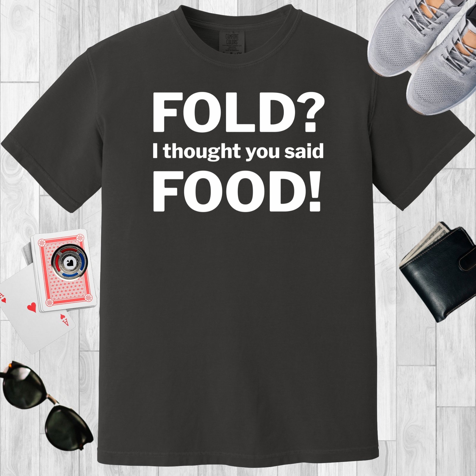Graphite colored unisex crewneck poker-themed T-shirt. Design features the text 'Fold? I thought you said food!'.